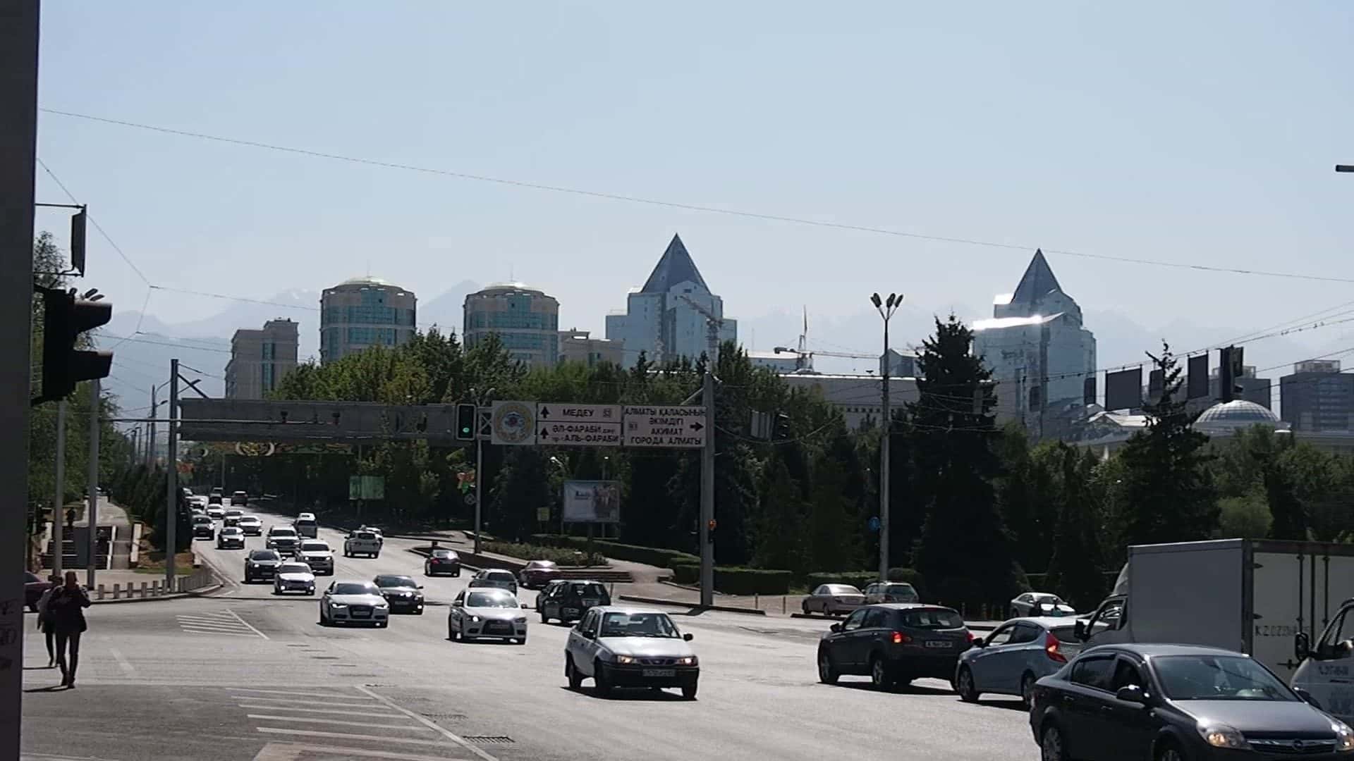 Heavy traffic on Al-Farabi Avenue in Almaty — without a driver you would drive a minibus here yourself