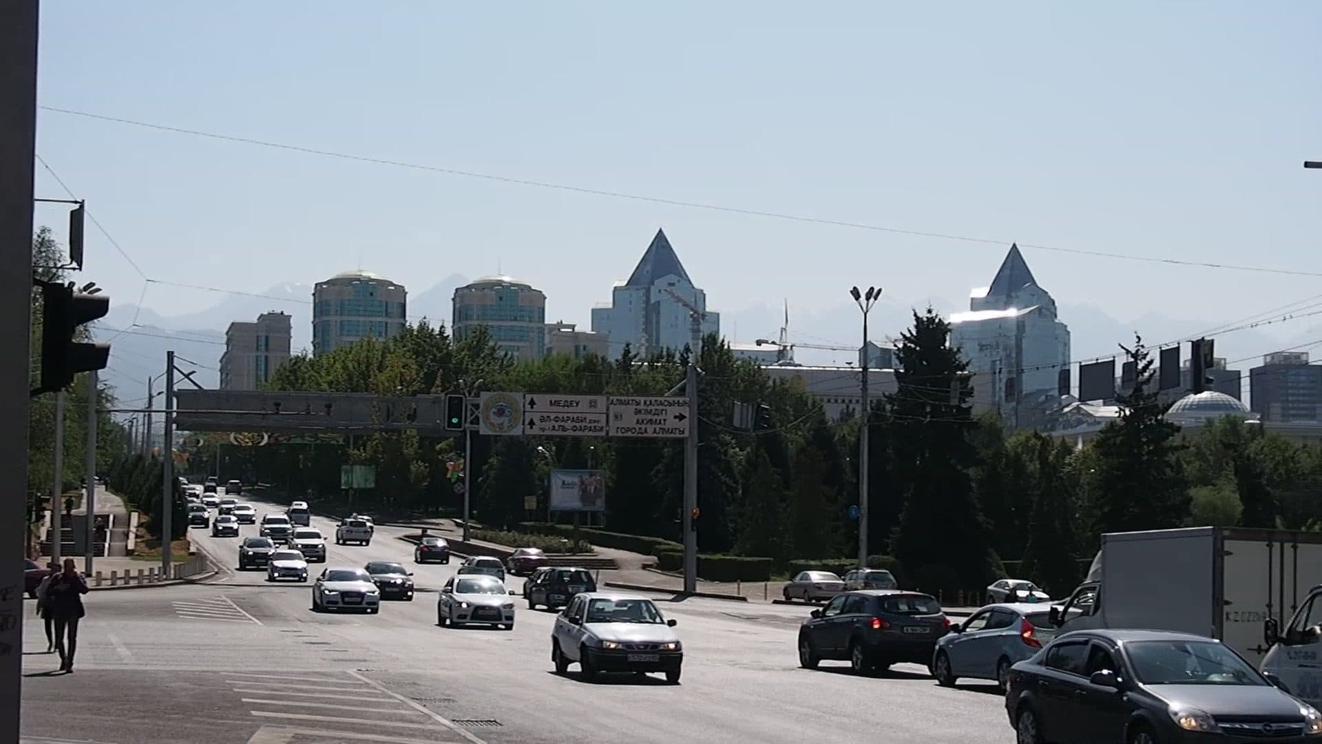 Heavy traffic on Al-Farabi Avenue in Almaty — without a driver you would drive a minibus here yourself